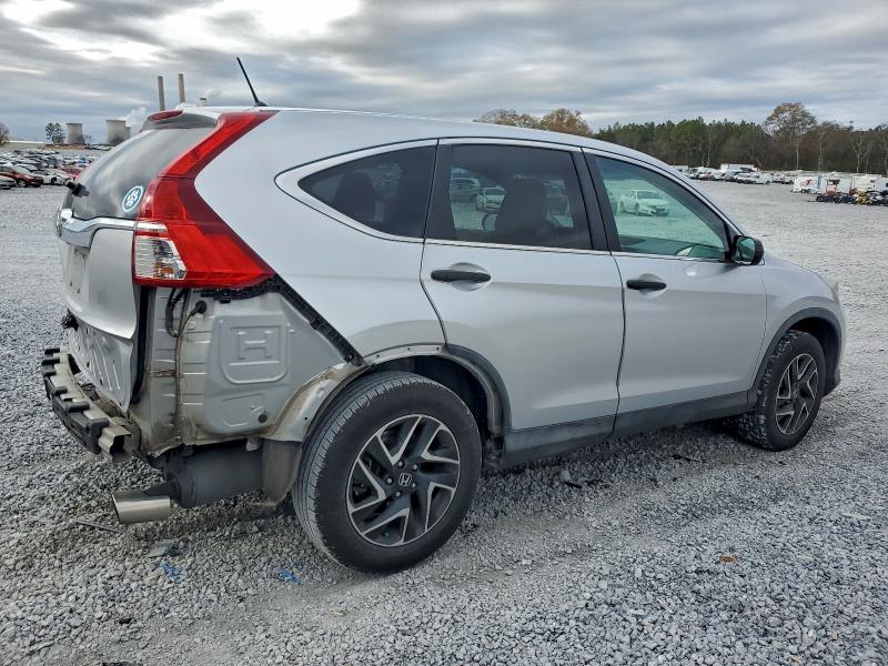 Photo 3 from auction – 2016 HONDA CR-V with VIN 2HKRM3H44GH537214