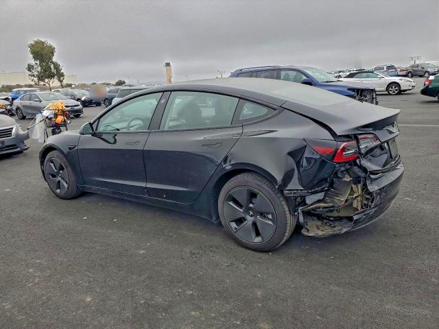 Photo 2 from auction – 2023 TESLA MODEL 3 with VIN 5YJ3E1EA7PF555397
