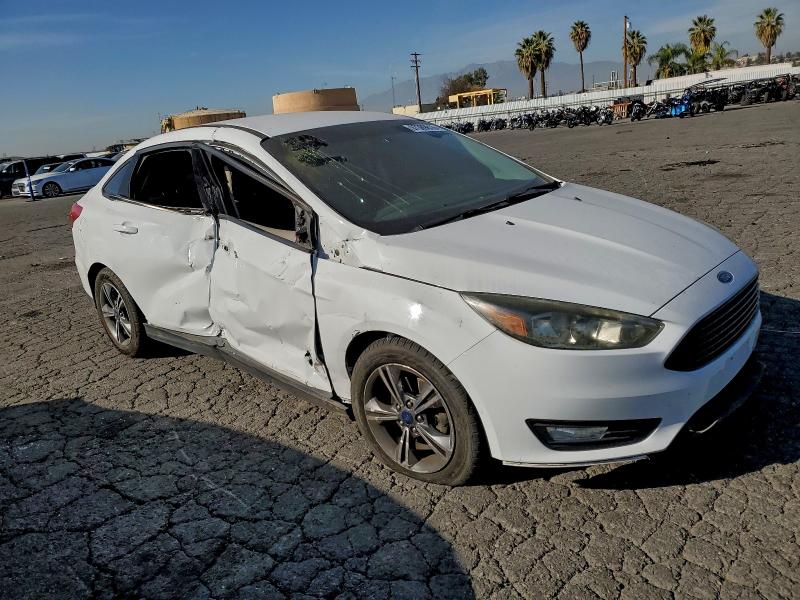Photo 4 from auction – 2016 FORD FOCUS SE with VIN 1FADP3FE9GL331997