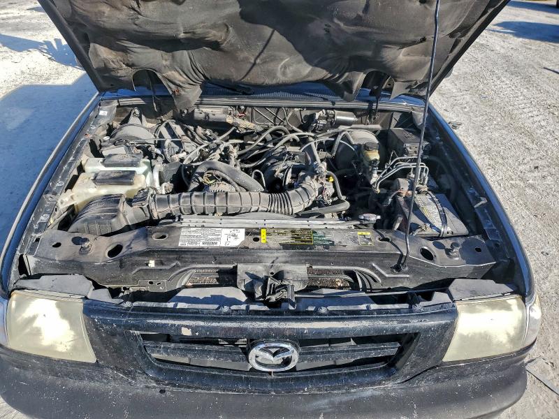 Photo 11 from auction – 2003 MAZDA B3000 with VIN 4F4YR12UX3TM18719