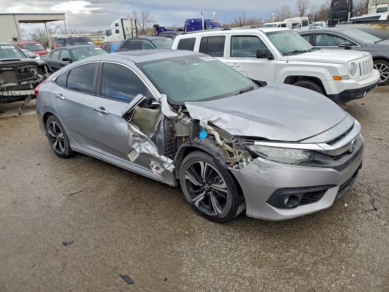 Photo 4 from auction – 2016 HONDA CIVIC TOUR with VIN 19XFC1F99GE038647