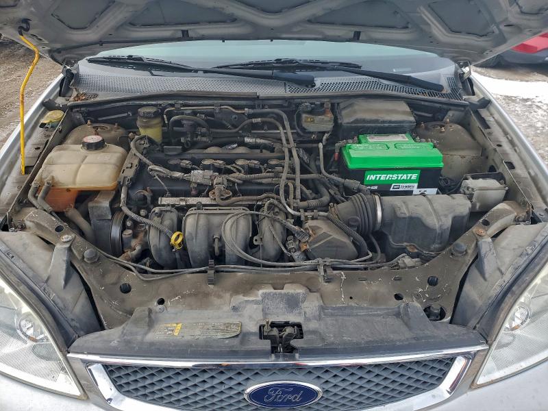 Photo 11 from auction – 2005 FORD FOCUS with VIN 1FAFP34N05W170673