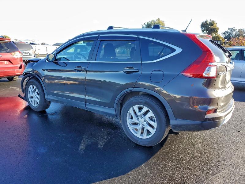 Photo 2 from auction – 2015 HONDA CR-V EXL with VIN 2HKRM3H77FH502224