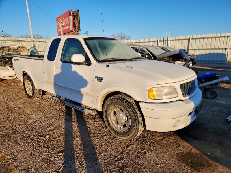 Photo 4 from auction – 2003 FORD F150 with VIN 2FTRX17WX3CA42241