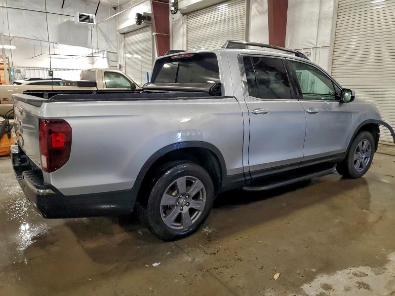 Photo 3 from auction – 2020 HONDA RIDGELINE with VIN 5FPYK3F79LB007562