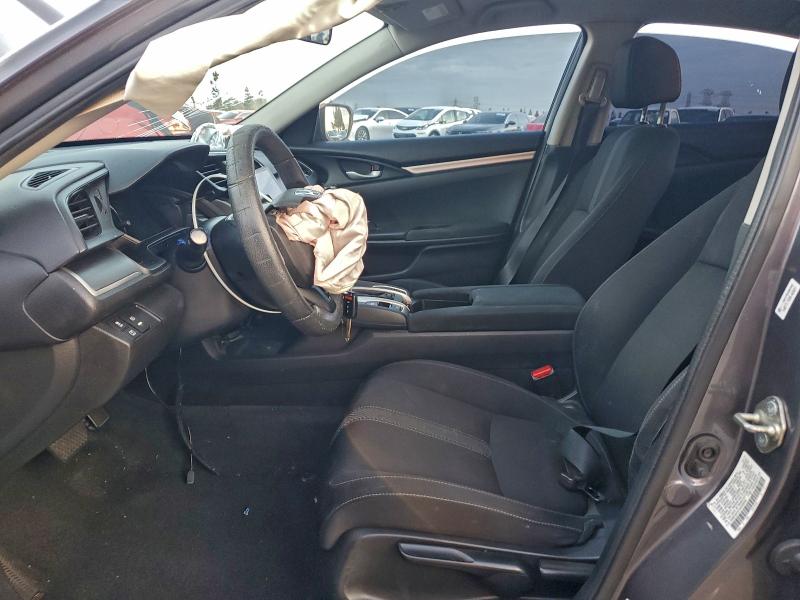 Photo 7 from auction – 2017 HONDA CIVIC LX with VIN 2HGFC2F51HH558349