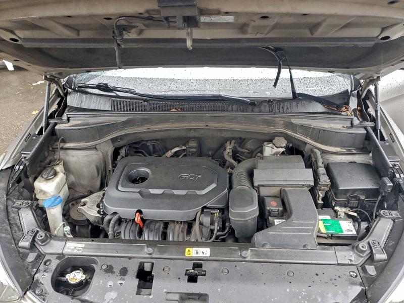 Photo 12 from auction – 2017 HYUNDAI SANTA FE S with VIN 5NMZU3LB0HH016589