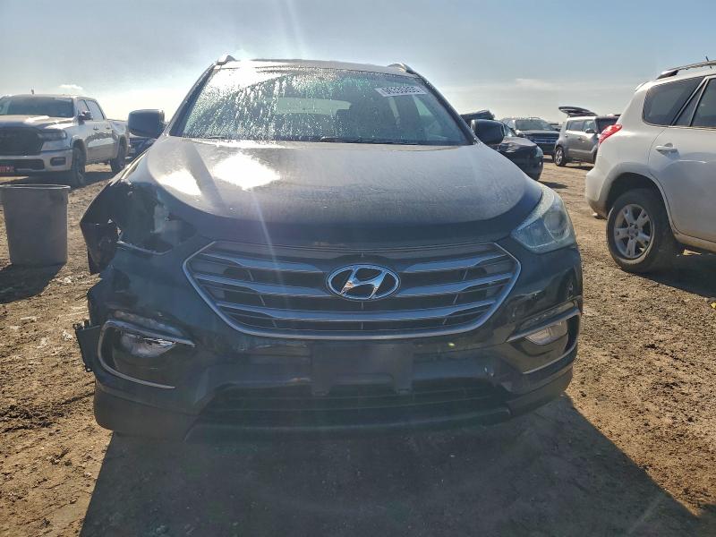 Photo 5 from auction – 2017 HYUNDAI SANTA FE S with VIN 5NMZU3LB6HH017438