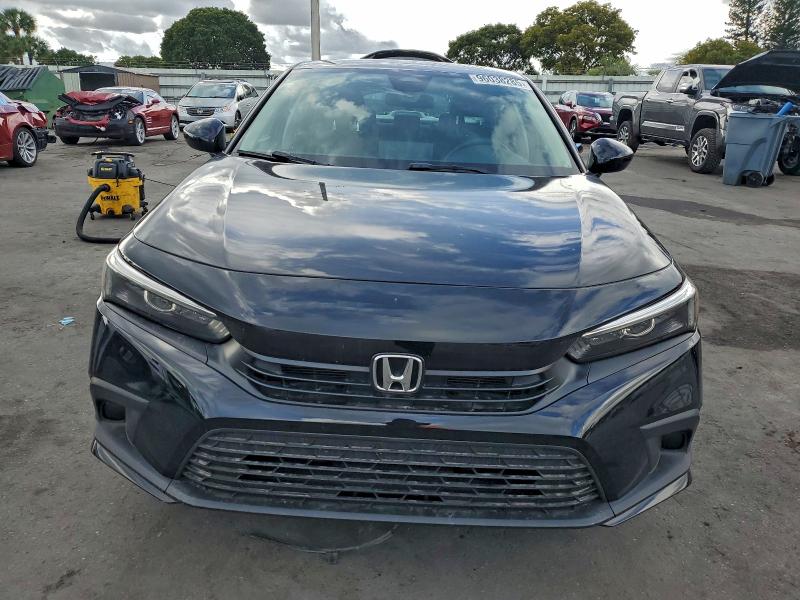 Photo 5 from auction – 2022 HONDA CIVIC LX with VIN 2HGFE2F28NH520144