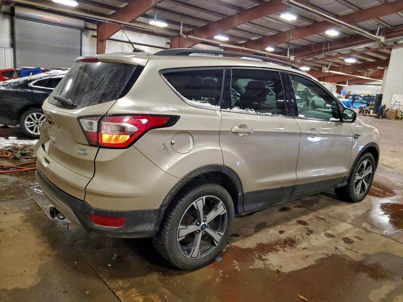 Photo 3 from auction – 2017 FORD ESCAPE SE with VIN 1FMCU9GD8HUB99958