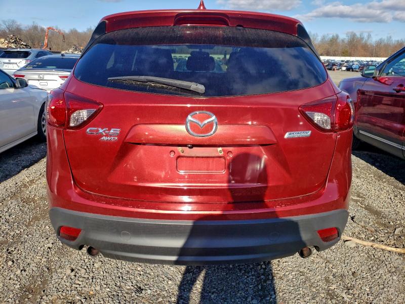 Photo 6 from auction – 2013 MAZDA CX-5 TOURI with VIN JM3KE4CE1D0142251