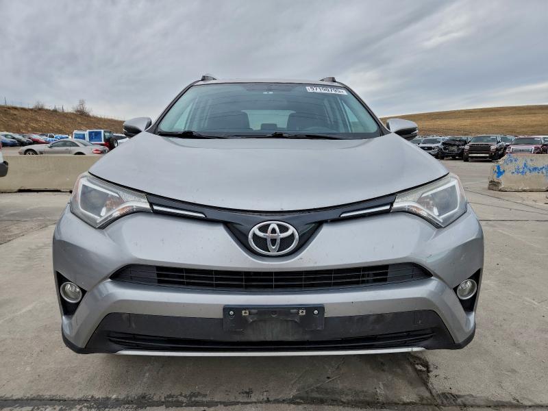 Photo 5 from auction – 2016 TOYOTA RAV4 XLE with VIN 2T3WFREV9GW241630
