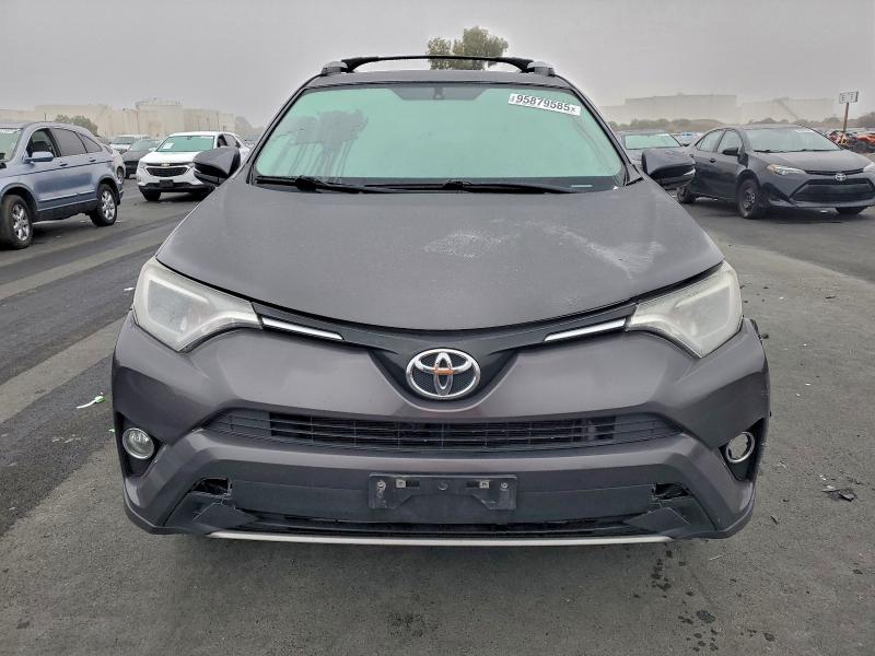 Photo 5 from auction – 2016 TOYOTA RAV4 XLE with VIN 2T3WFREV6GW309110