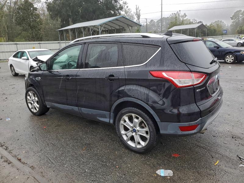 Photo 2 from auction – 2016 FORD ESCAPE TIT with VIN 1FMCU9JX5GUA79813