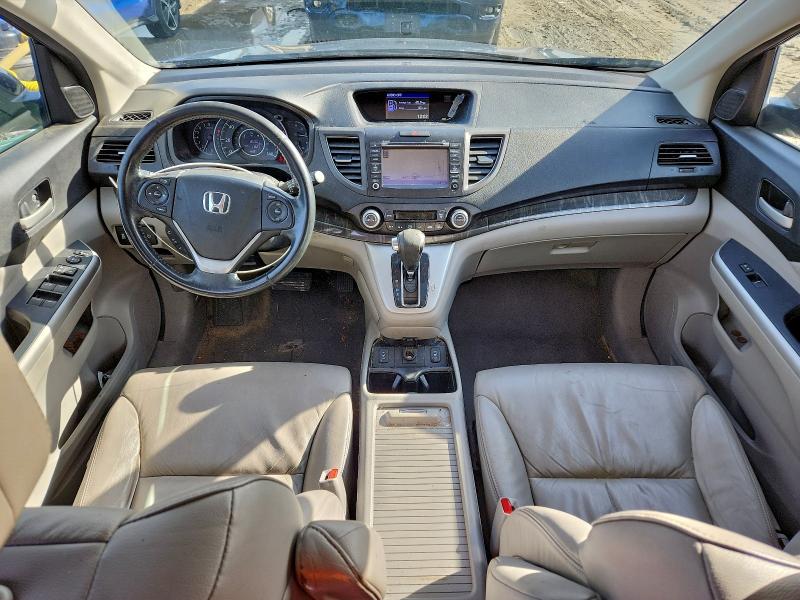 Photo 8 from auction – 2014 HONDA CRV with VIN 5J6RM4H71EL077528