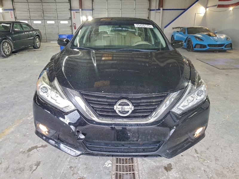 Photo 5 from auction – 2016 NISSAN ALTIMA with VIN 1N4AL3AP8GC141339