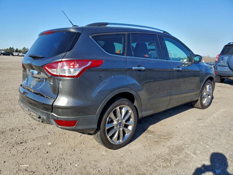 Photo 3 from auction – 2016 FORD ESCAPE SE with VIN 1FMCU9G98GUB79302