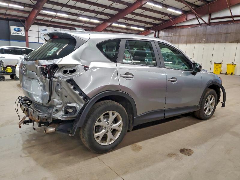 Photo 3 from auction – 2013 MAZDA CX-5 SPORT with VIN JM3KE2BEXD0100120