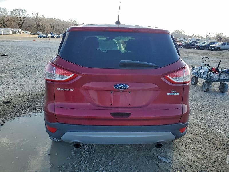 Photo 6 from auction – 2014 FORD ESCAPE with VIN 1FMCU0GX0EUB84856