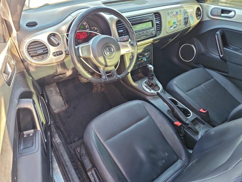 Photo 8 from auction – 2012 VOLKSWAGEN BEETLE with VIN 3VWJX7AT5CM661054