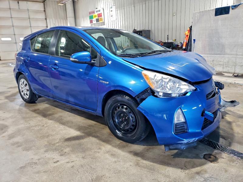 Photo 4 from auction – 2013 TOYOTA PRIUS C with VIN JTDKDTB3XD1557083