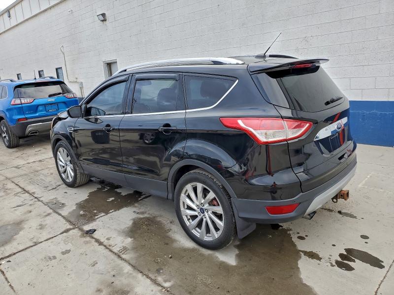 Photo 2 from auction – 2016 FORD ESCAPE TIT with VIN 1FMCU9J97GUA53201