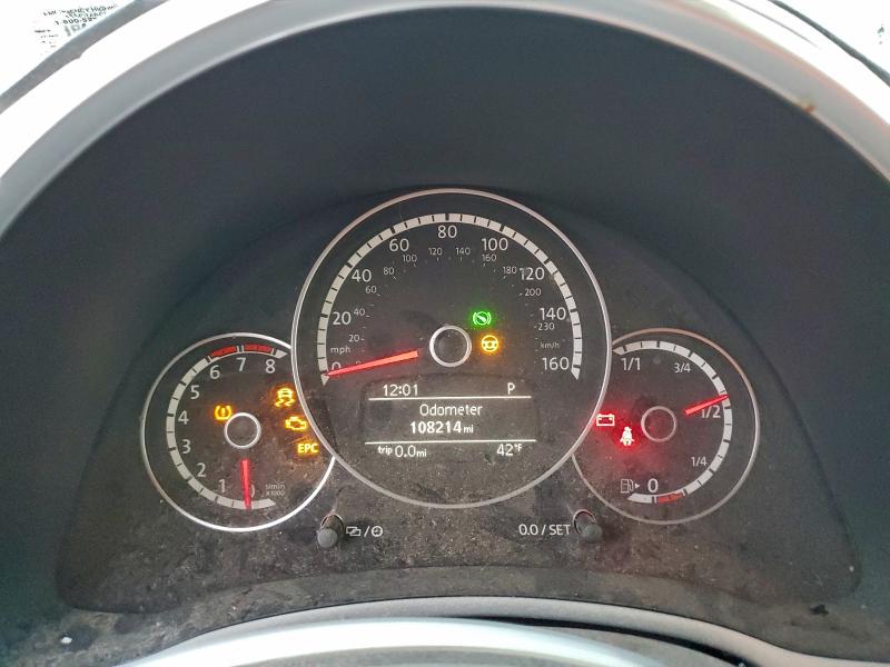 Photo 9 from auction – 2014 VOLKSWAGEN BEETLE with VIN 3VWJ17AT7EM659875