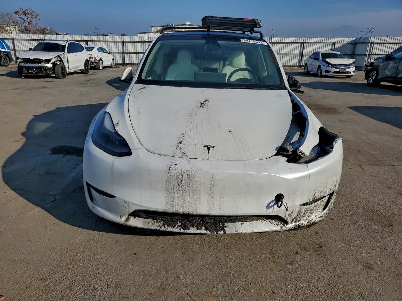 Photo 5 from auction – 2023 TESLA MODEL Y with VIN 7SAYGAEE3PF785881