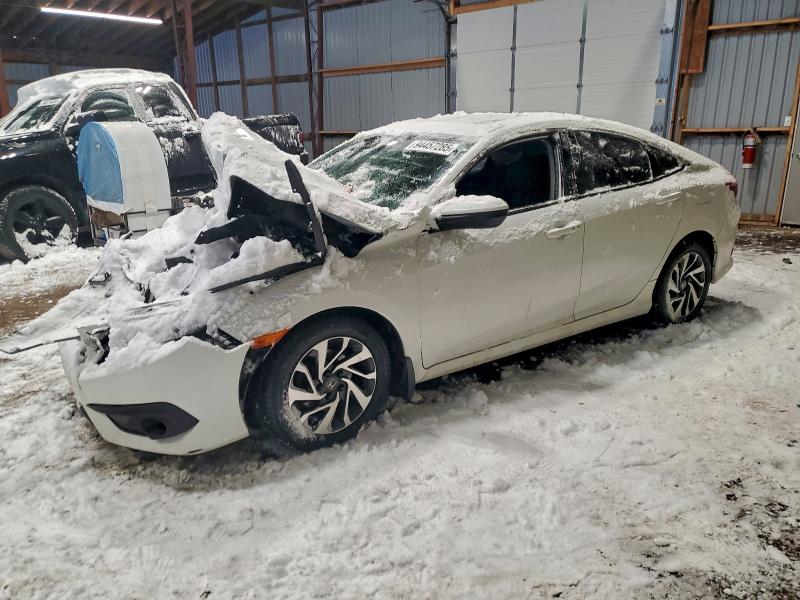 HONDA CIVIC EX 2016 with VIN 2HGFC2F86GH024871 - Photo from auction