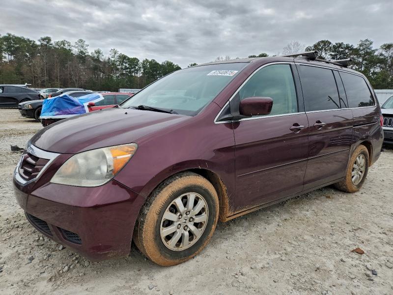 HONDA ODYSSEY EX 2010 with VIN 5FNRL3H73AB080494 - Photo from auction