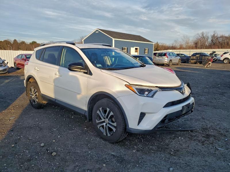 Photo 4 from auction – 2016 TOYOTA RAV4 LE with VIN JTMBFREV3GD197085