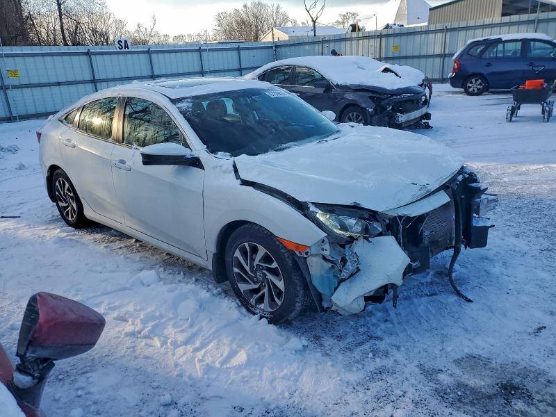 Photo 4 from auction – 2018 HONDA CIVIC EX with VIN 2HGFC2F77JH506473