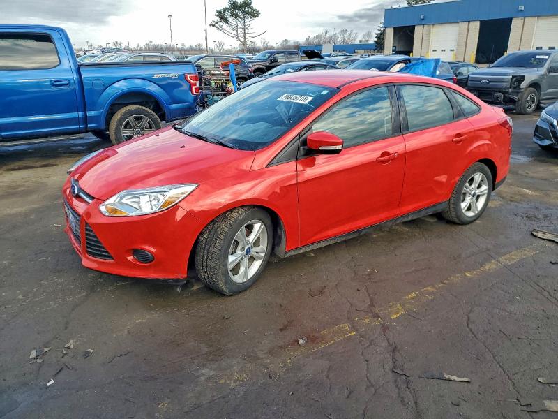 FORD FOCUS SE 2014 with VIN 1FADP3F23EL117221 - Photo from auction