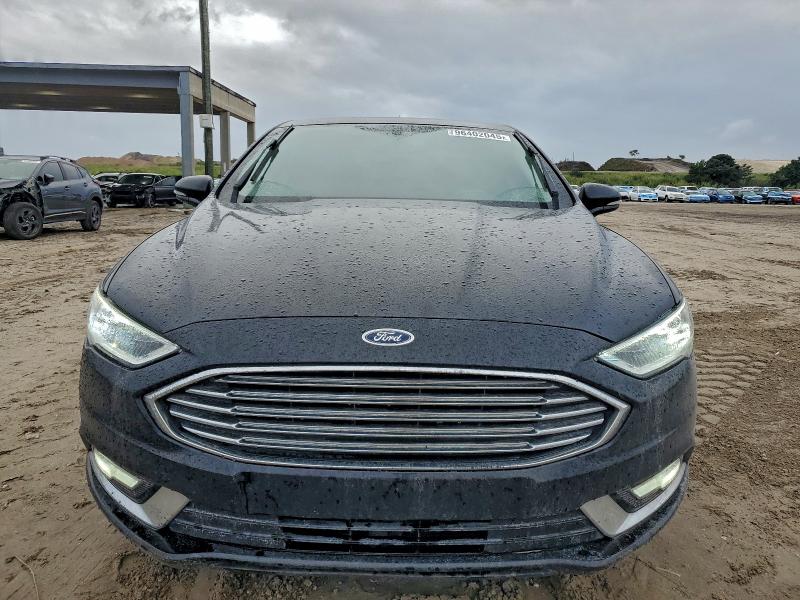 Photo 5 from auction – 2018 FORD FUSION TIT with VIN 3FA6P0D98JR194007