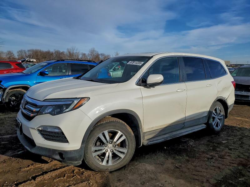 HONDA PILOT EXL 2017 with VIN 5FNYF6H63HB035562 - Photo from auction