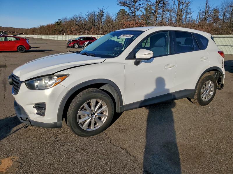 MAZDA CX-5 TOURI 2016 with VIN JM3KE4CY0G0799878 - Photo from auction