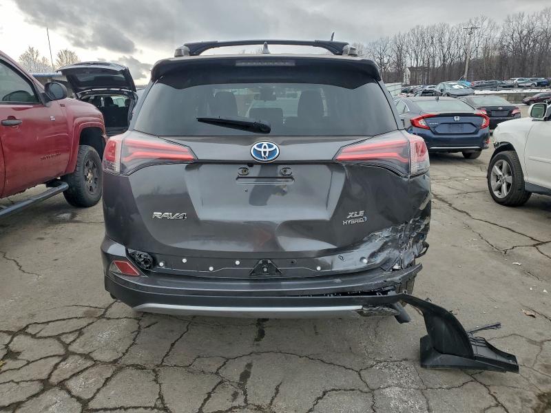 Photo 6 from auction – 2017 TOYOTA RAV4 HV LE with VIN JTMRJREV0HD136016