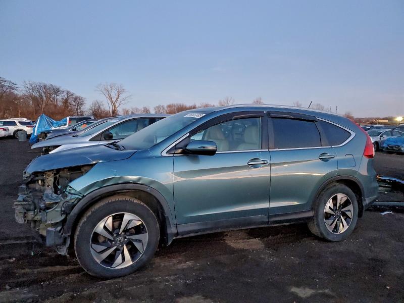 Photo 1 from auction – 2016 HONDA CR-V TOURI with VIN 5J6RM4H98GL010428