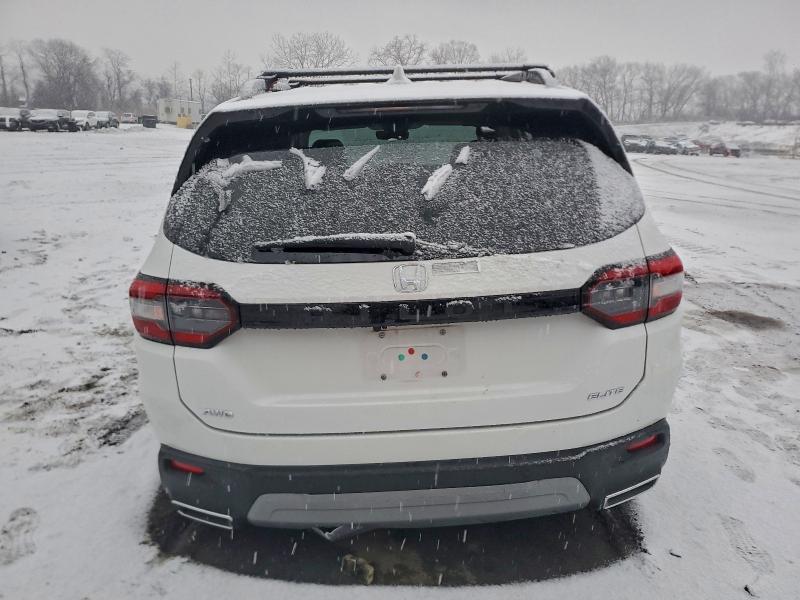 Photo 6 from auction – 2023 HONDA PILOT ELIT with VIN 5FNYG1H85PB009593