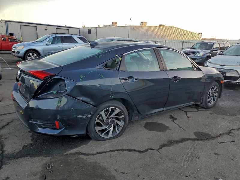 Photo 3 from auction – 2018 HONDA CIVIC EX with VIN 2HGFC2F71JH524256