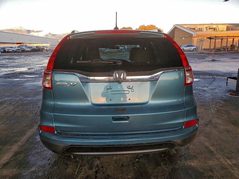 Photo 6 from auction – 2015 HONDA CR-V EXL with VIN 2HKRM3H72FH557518