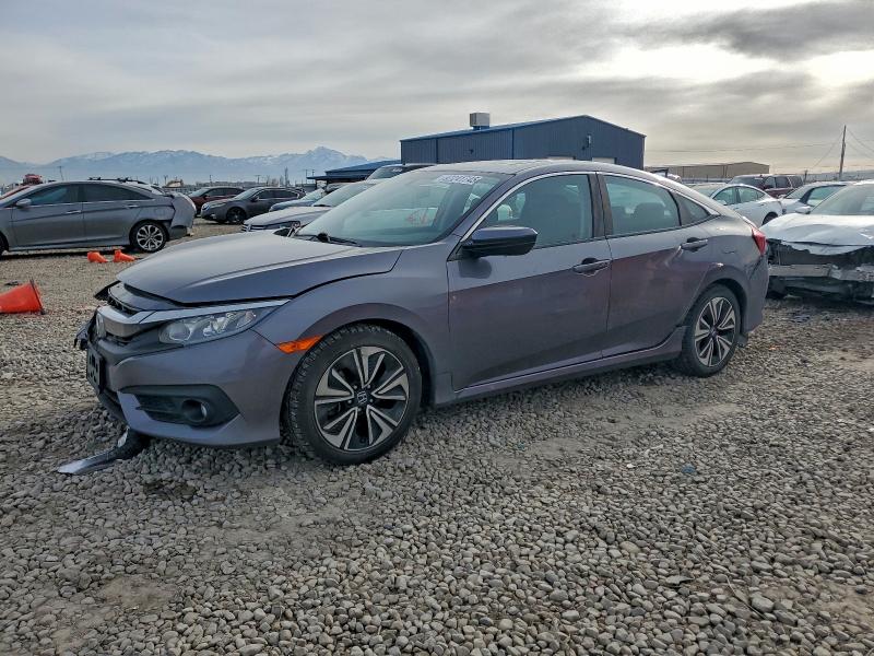Photo 1 from auction – 2017 HONDA CIVIC EX with VIN 19XFC1F34HE004807