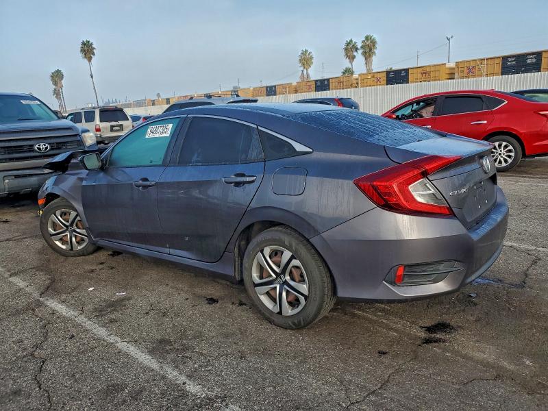 Photo 2 from auction – 2017 HONDA CIVIC LX with VIN 2HGFC2F59HH521257