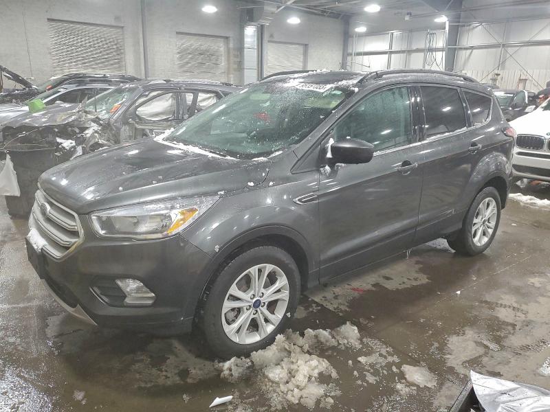 FORD ESCAPE SE 2018 with VIN 1FMCU9GD4JUC61927 - Photo from auction