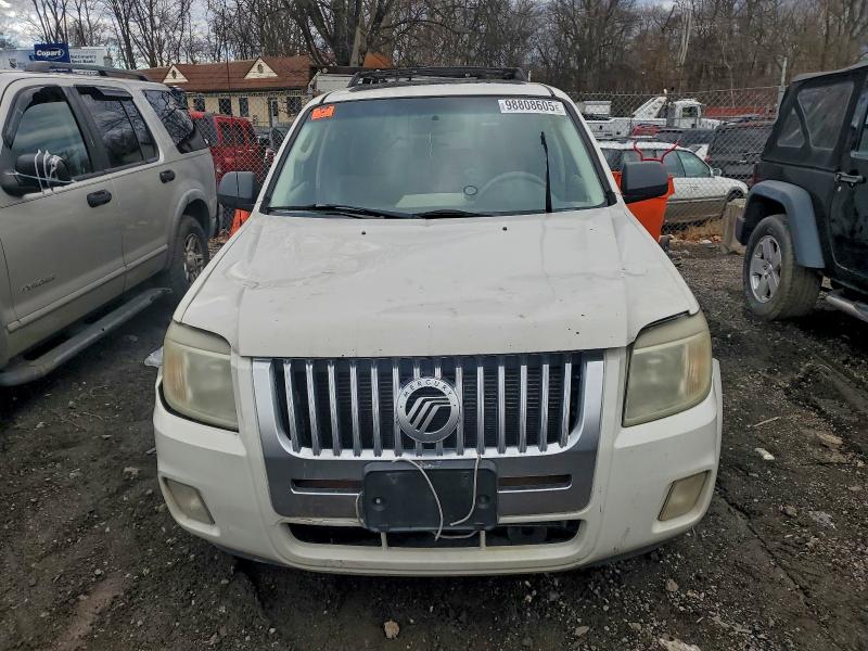 Photo 5 from auction – 2009 MERCURY MARINER with VIN 4M2CU81739KJ20902