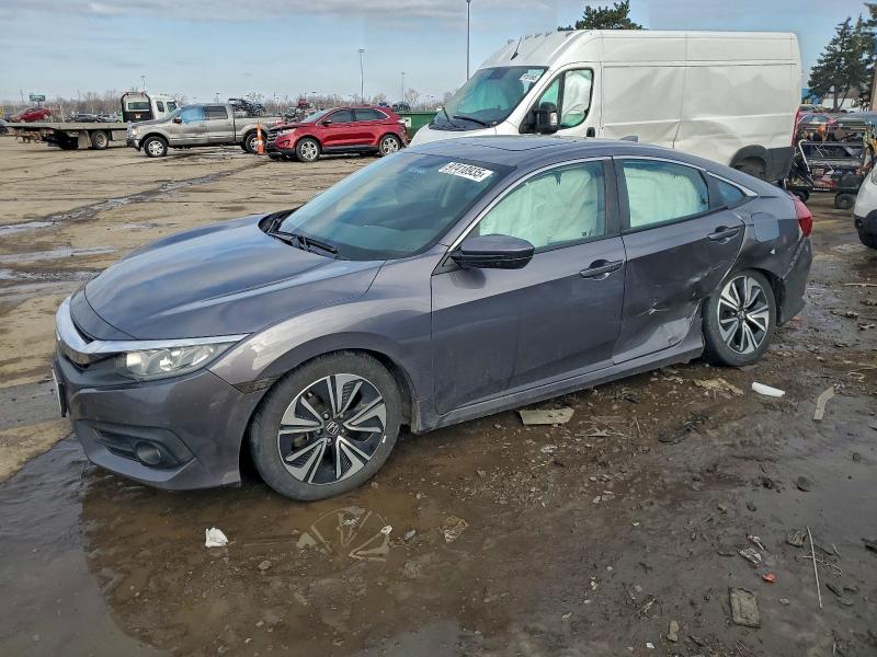 Photo 1 from auction – 2017 HONDA CIVIC EX with VIN 19XFC1F30HE029235