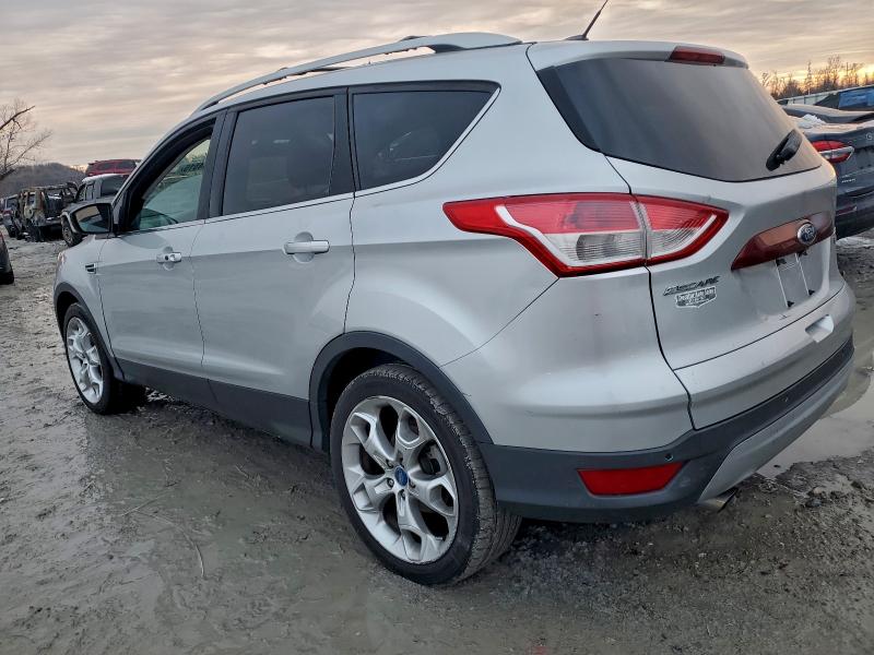 Photo 2 from auction – 2014 FORD ESCAPE TIT with VIN 1FMCU0JXXEUB60315