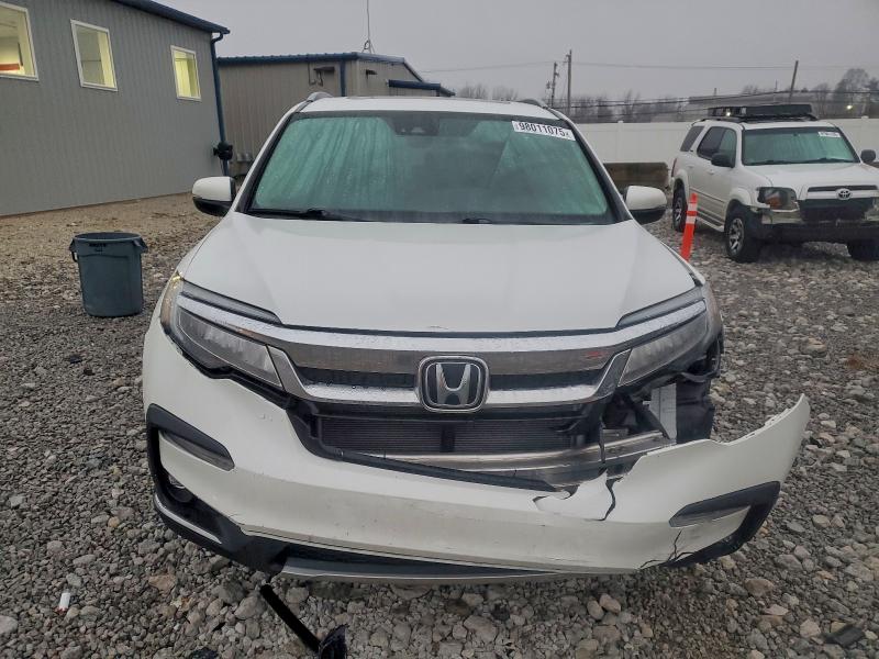 Photo 5 from auction – 2021 HONDA PILOT ELIT with VIN 5FNYF6H09MB021381
