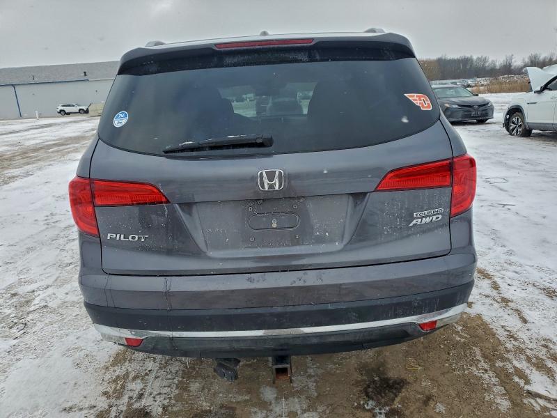 Photo 6 from auction – 2017 HONDA PILOT TOUR with VIN 5FNYF6H98HB021070