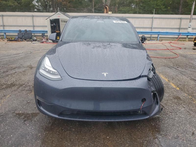 Photo 5 from auction – 2022 TESLA MODEL Y with VIN 7SAYGDEE2NF314609